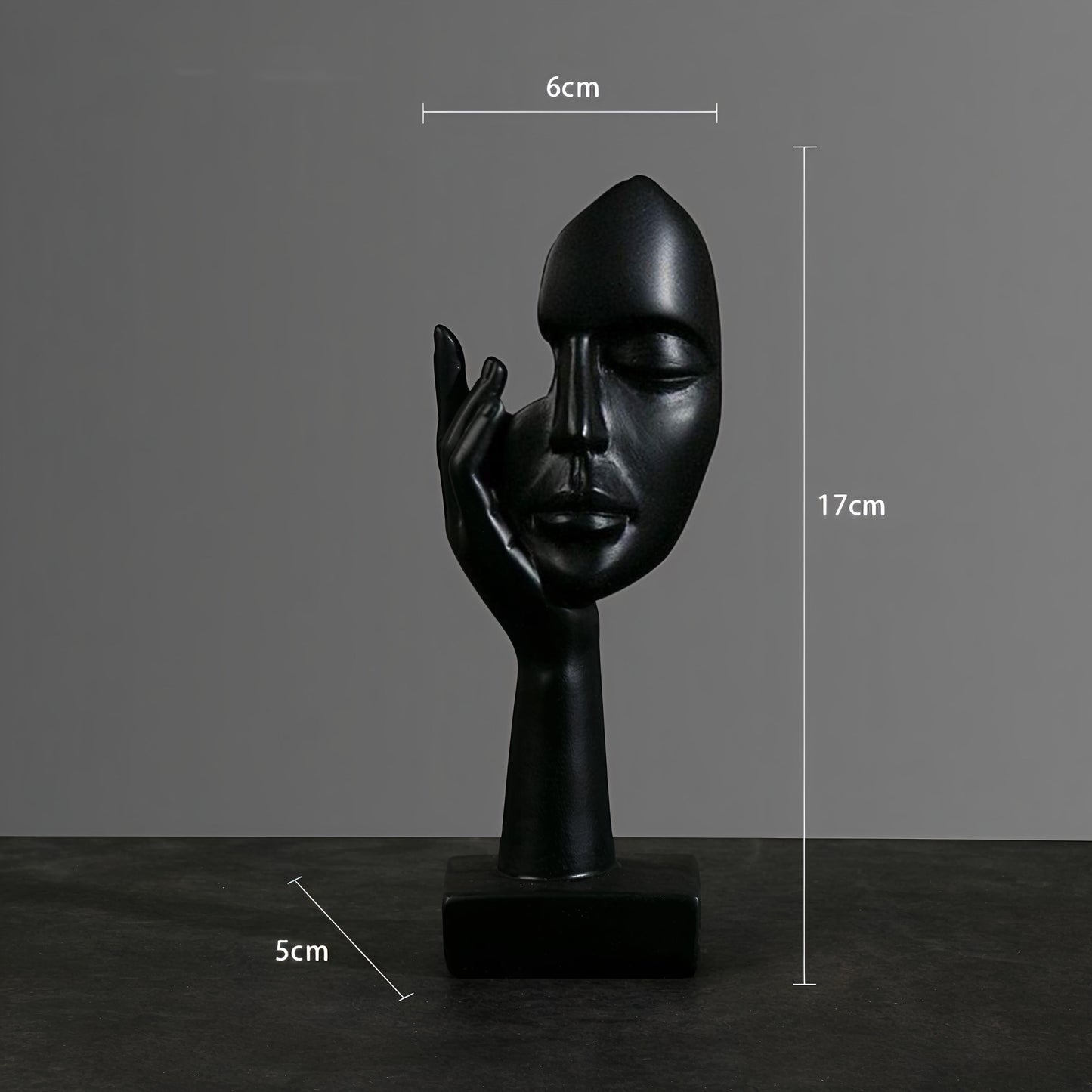 Black Serenity Face in Hand Resin Showpiece(17 x 6.5 cm)