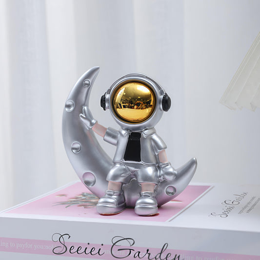 Cosmo Wave Astronaut on Crescent Moon (12 x 12 x 6 CM)